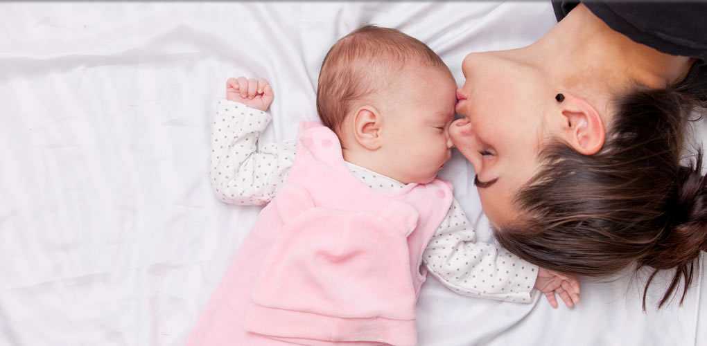 newborn baby with mother